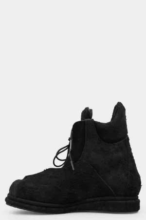 Distressed suede wing boots