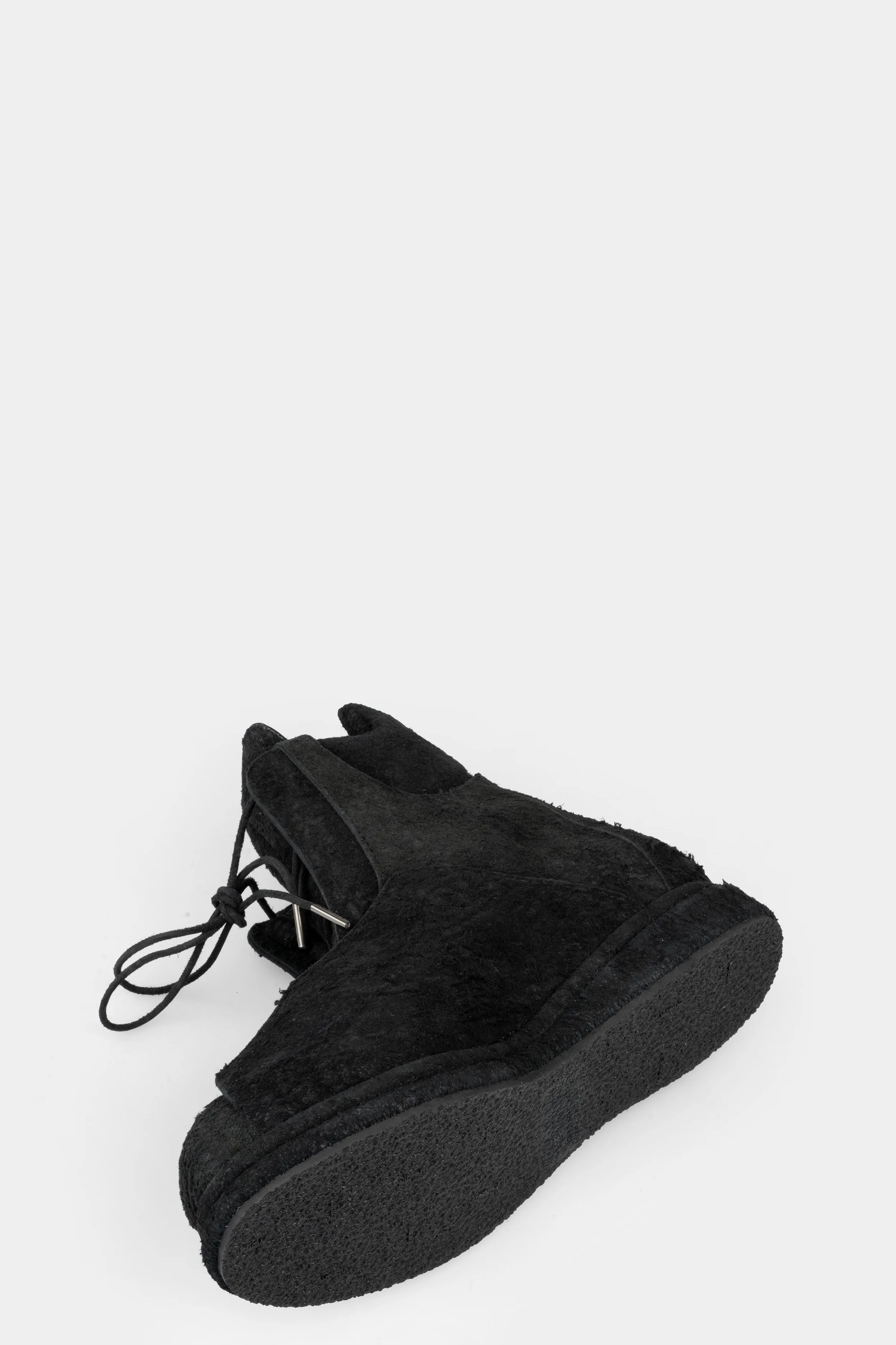 Distressed suede wing boots