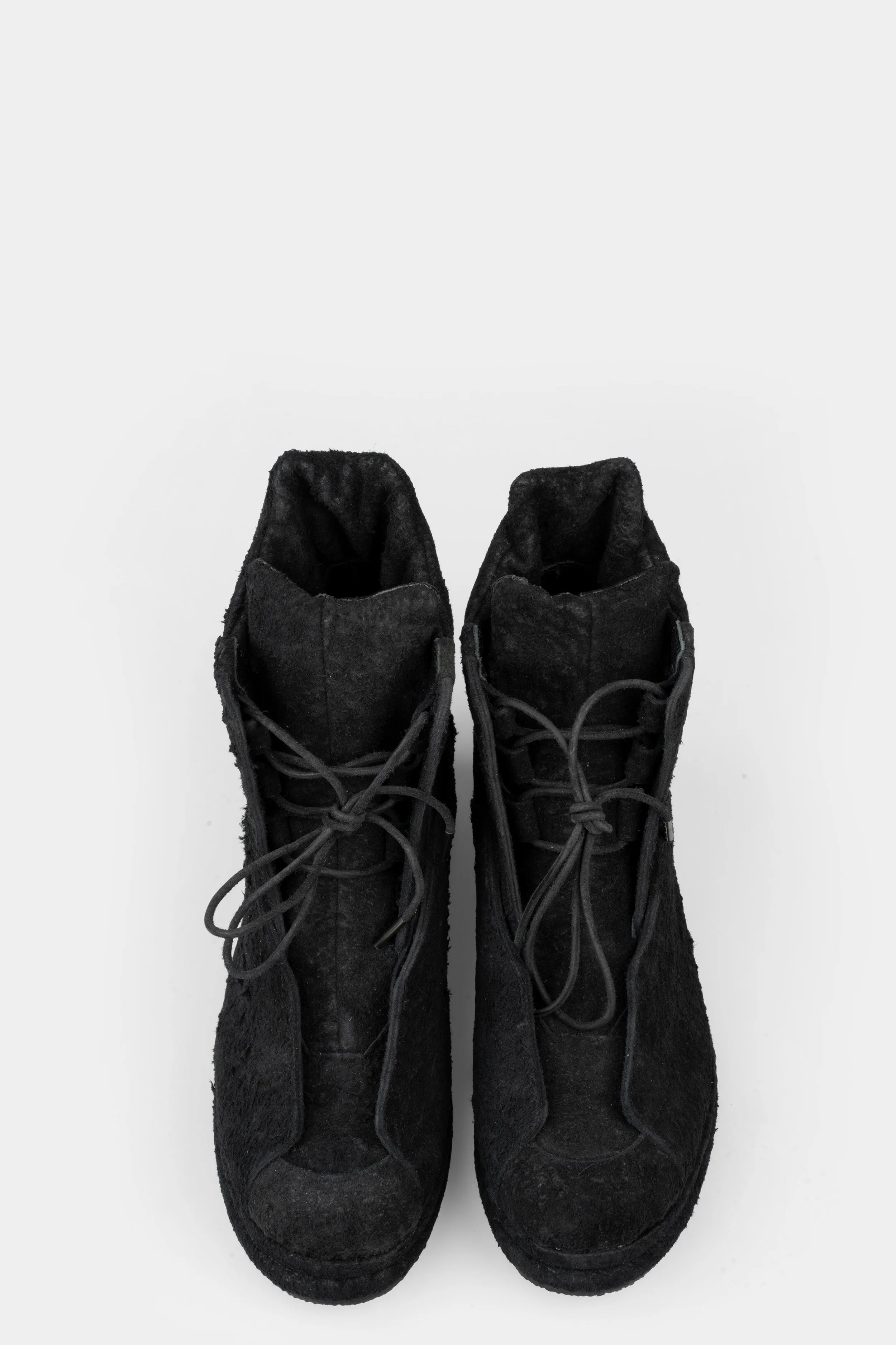 Distressed suede wing boots