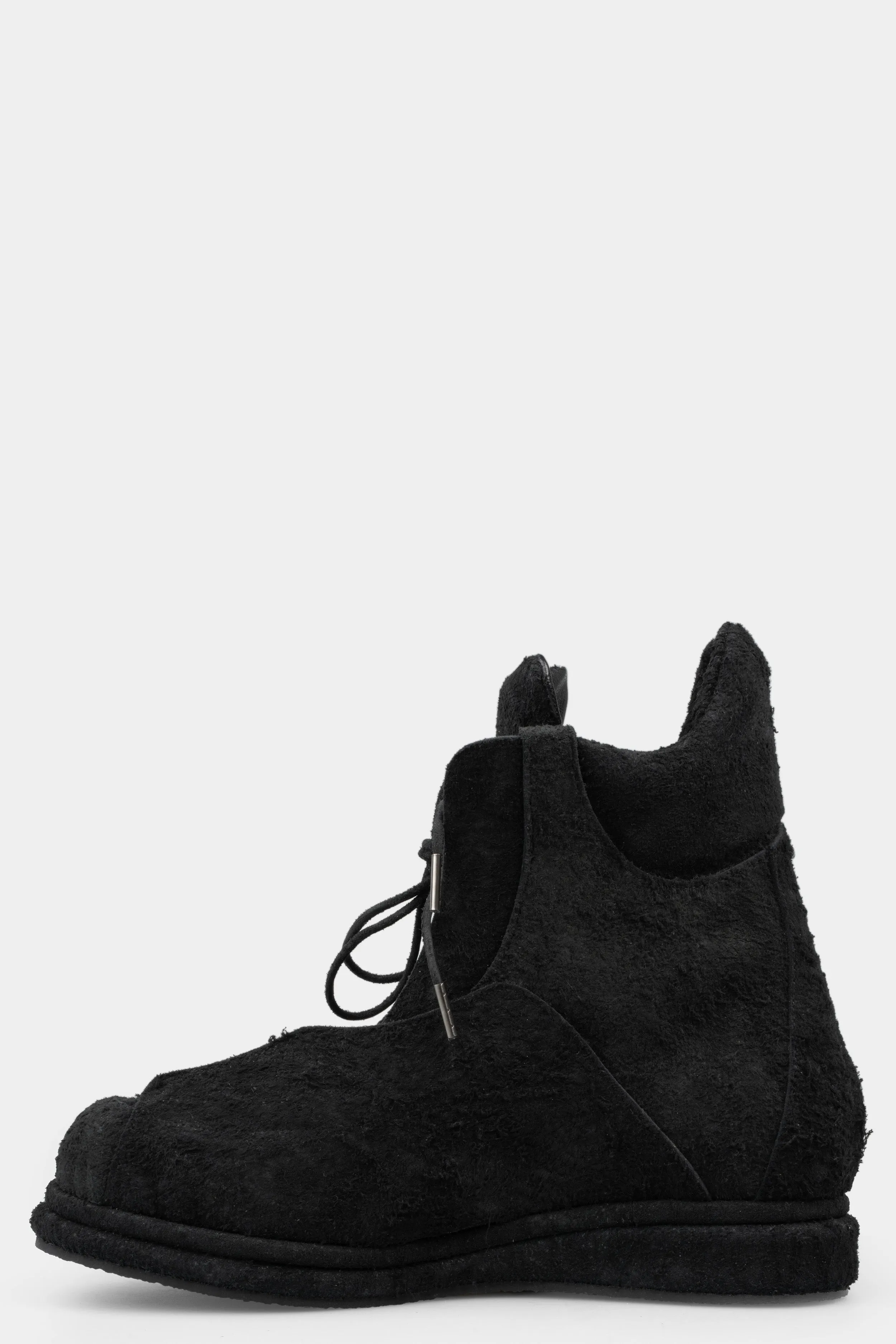 Distressed suede wing boots