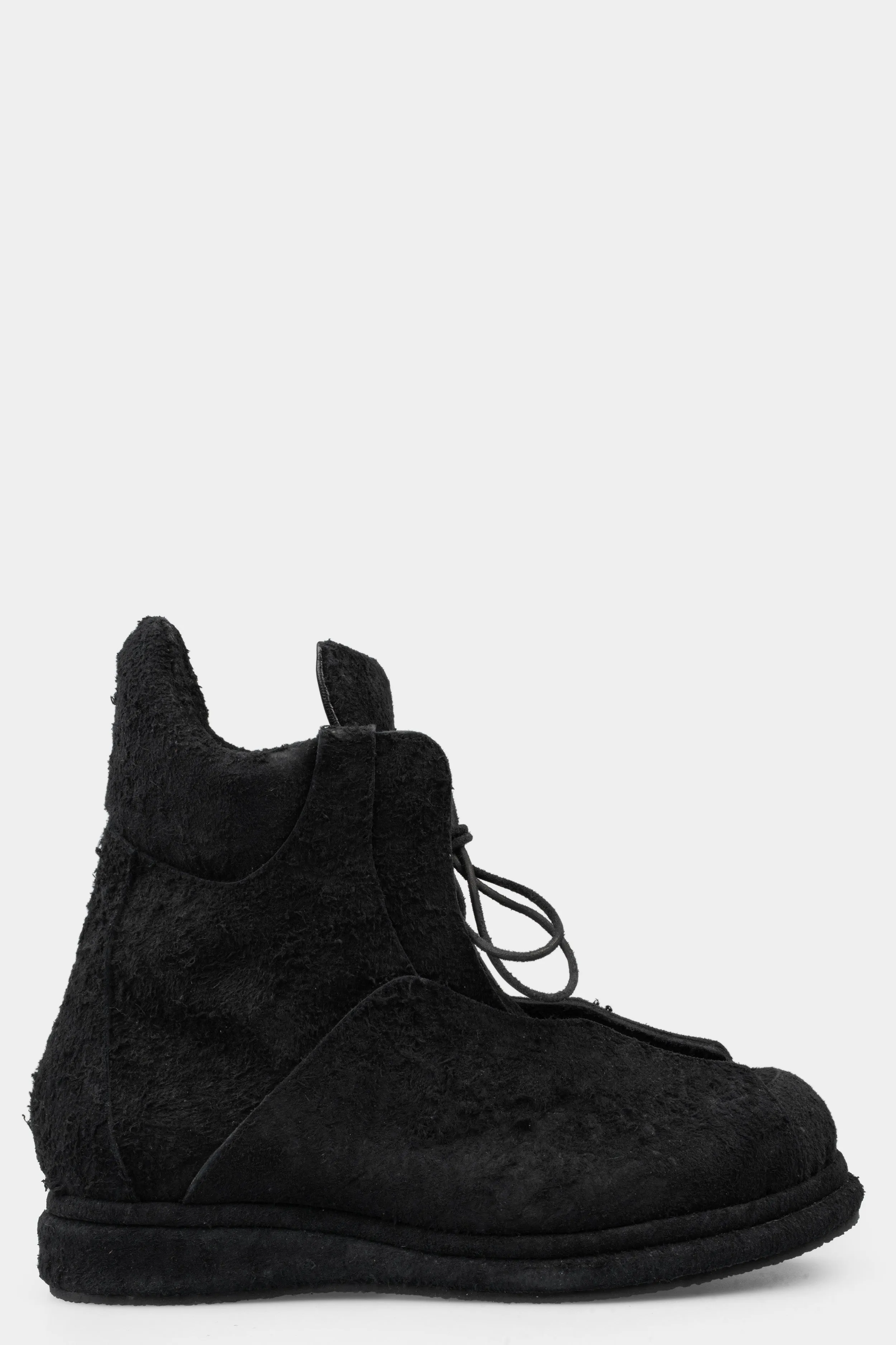 Distressed suede wing boots