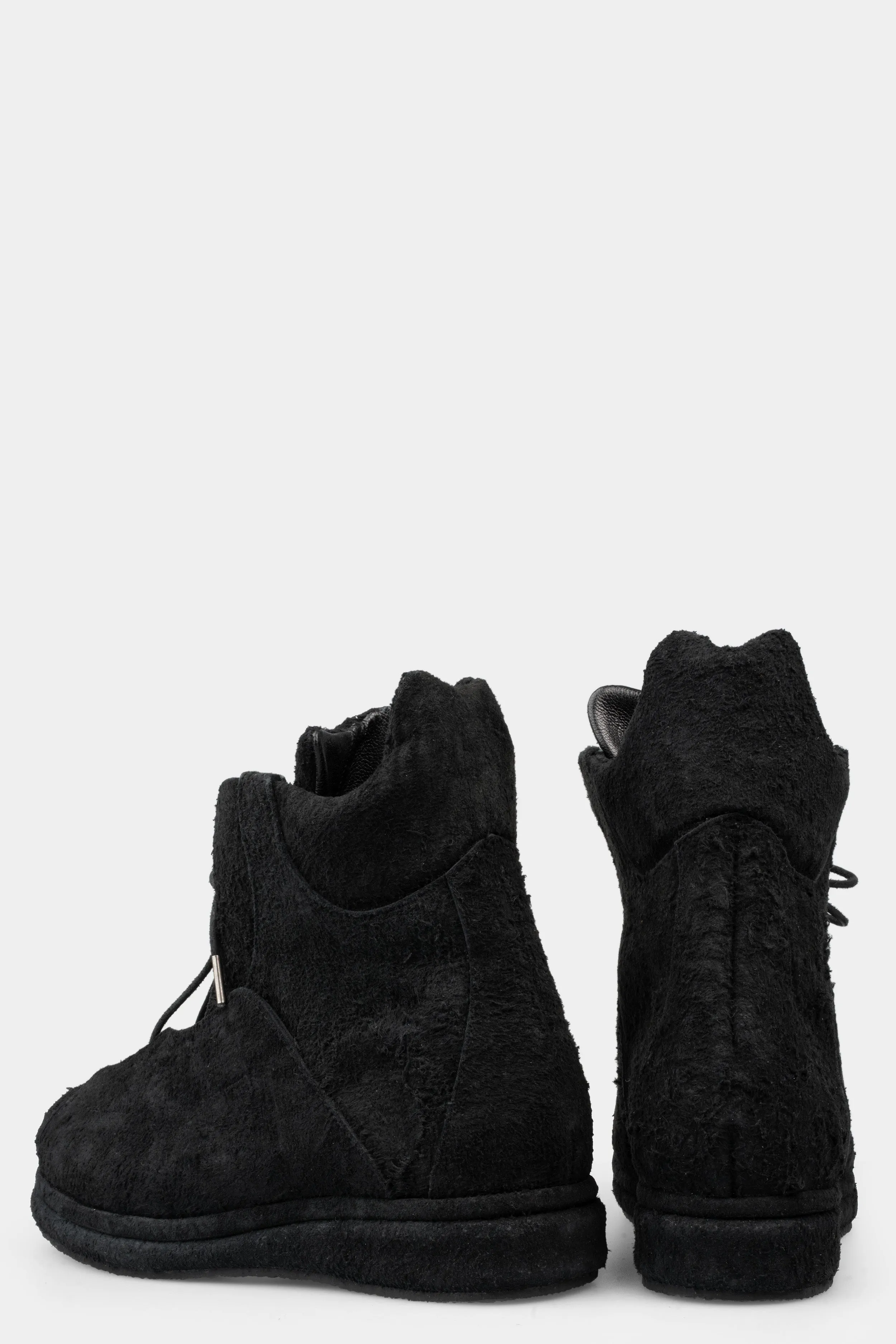 Distressed suede wing boots